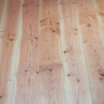 Massive planker af douglasgran 25x143 mm pr. kvadratmeter.